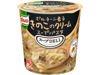 A cup of Ajinomoto Porcini Kaoru Kinoko no Cream Soup Pasta, showing the product packaging and the soup with mushrooms and pasta.
