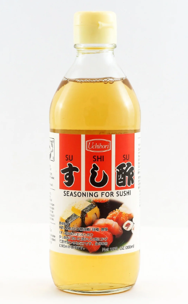 A bottle of Uchibori sushi vinegar with Japanese text on the label, indicating it is a product for seasoning sushi.
